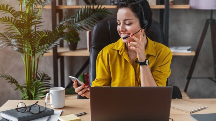Small business owner meeting with a virtual assistant during an online video call