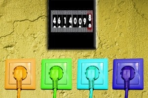 Investing in Energy Efficiency Ventures is the Next Big Thing coloured plug sockets on wall with meter reading above