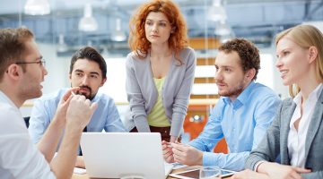 Business team listening to his leader with emphasis on a problem