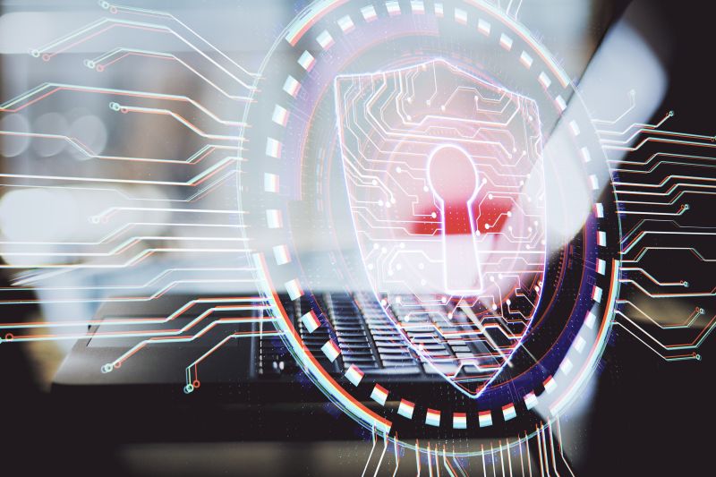 Laptop With Antivirus Shield Hologram. Web Safety And Protection Concept. Double Exposure