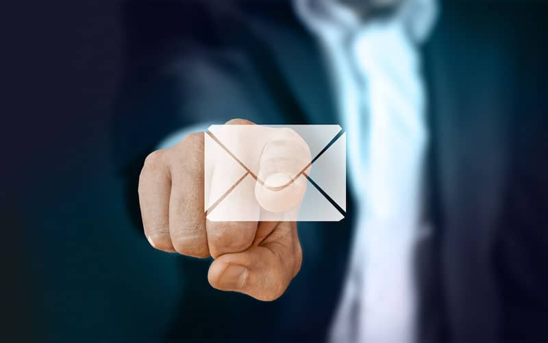 Email marketing = [erson pointing at email envelope