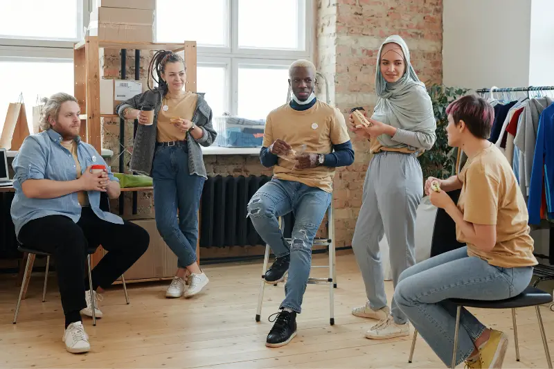 Group of employees chatting during break time