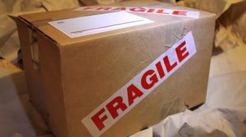 brown cardboard box parcel fragile tape