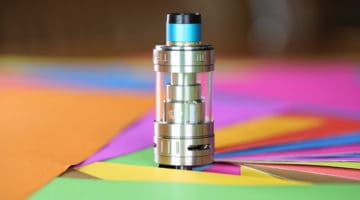 vape electronic cigarette uwell on coloured paper