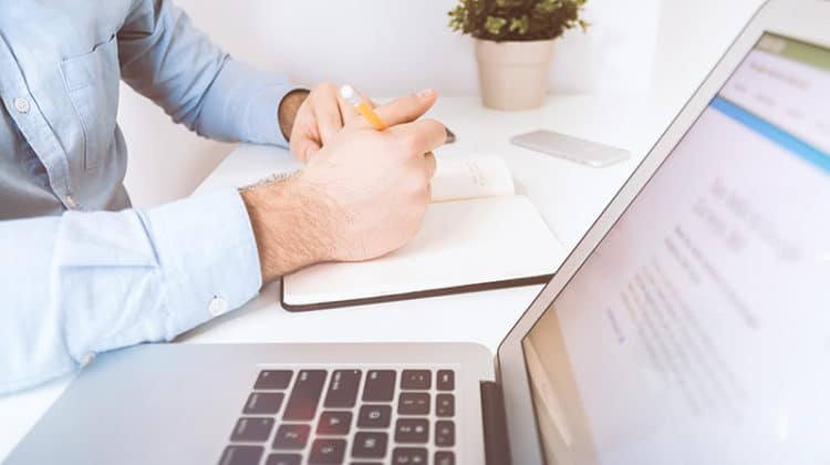 transferable skills for a ceo - businessman working and writing notes in office