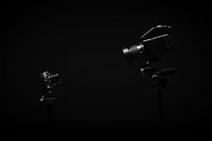 large camera pointing at a smaller camera