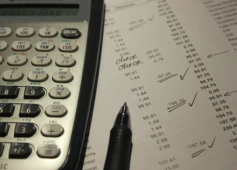 Tips for Organising Your Company’s Finances - calculator and list fo figures