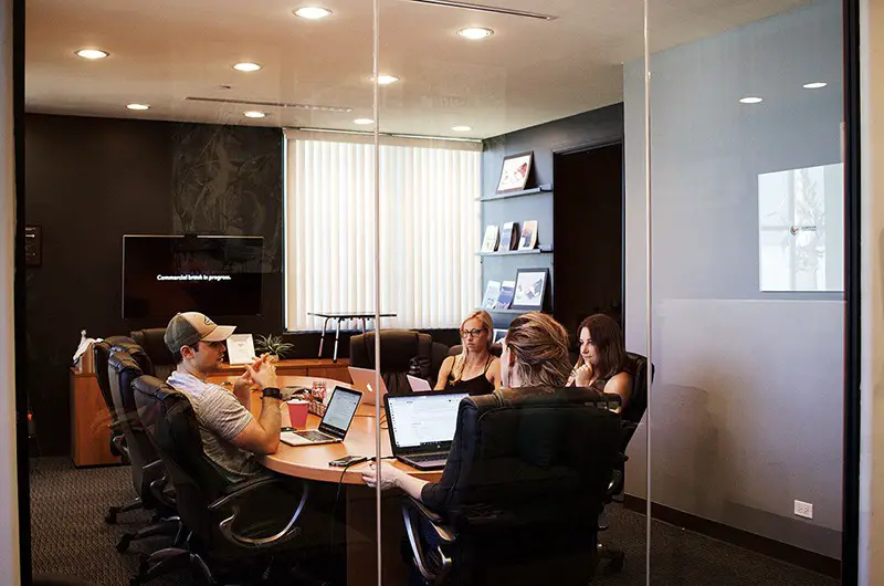 Leadership Insights - team in meeting room