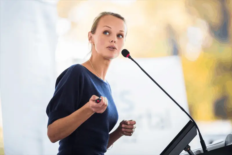 Woman giving presentation in a meeting room