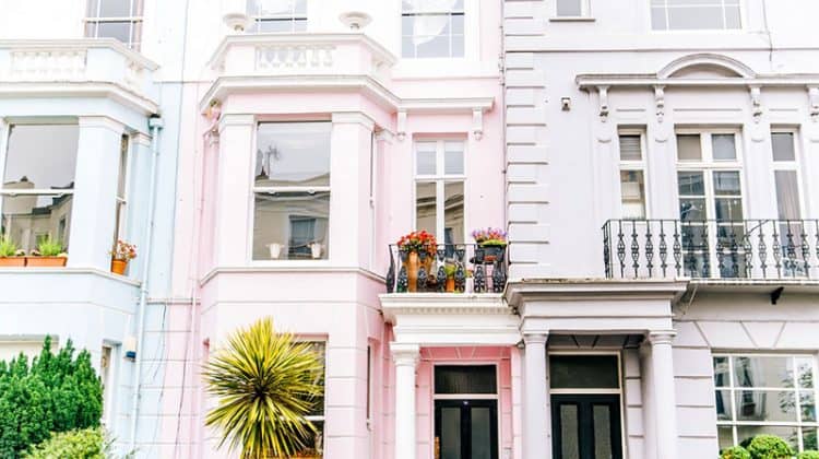 architectural photography of white and pink town house buildings