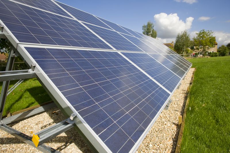 Large Solar Panels Underneath Blue Sky