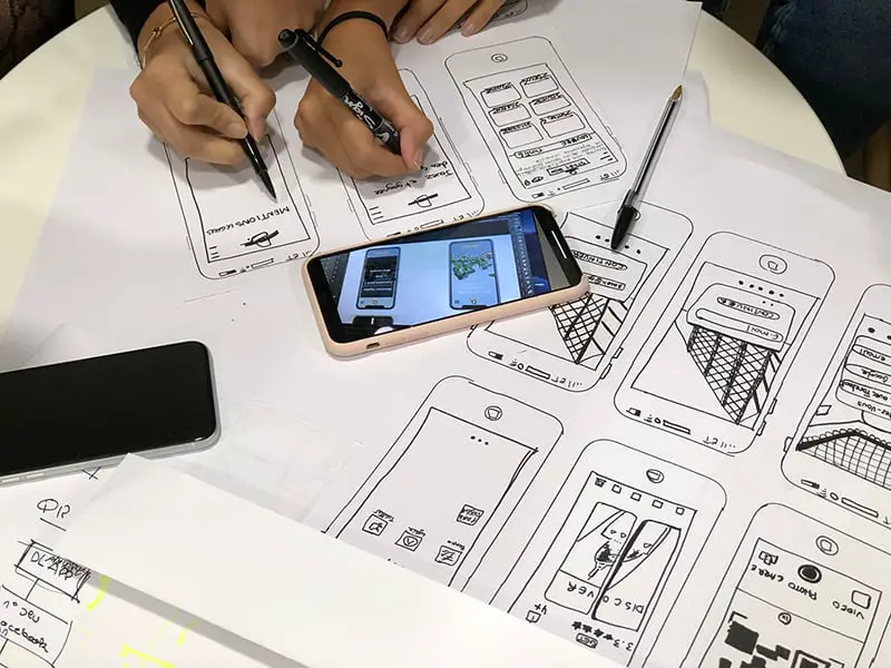 two app developers working on mobile app design – digital solutions and applications