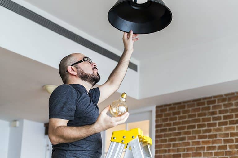 How to Change a Light Bulb in High Ceilings at Your Office Business