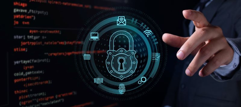 Businessman Interacting with Digital Cybersecurity Interface and Padlock