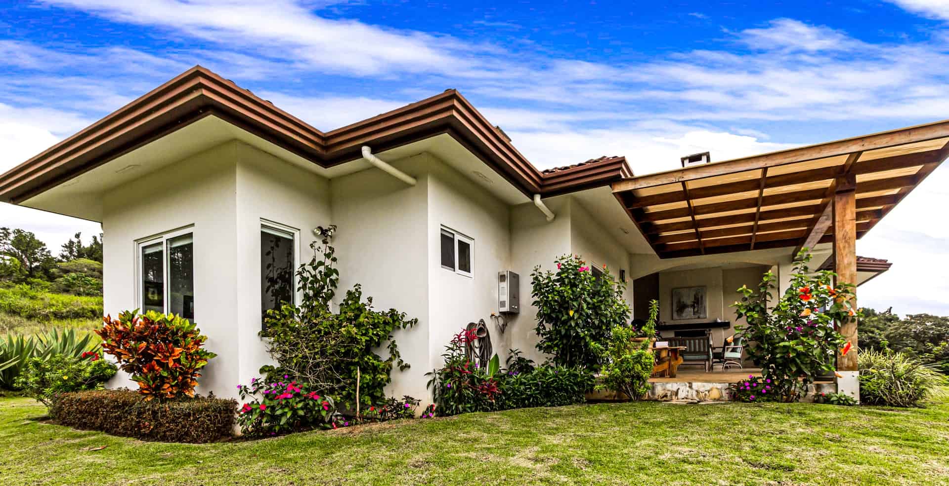 house for sale – flowers in garden - great curb appeal for quick sale