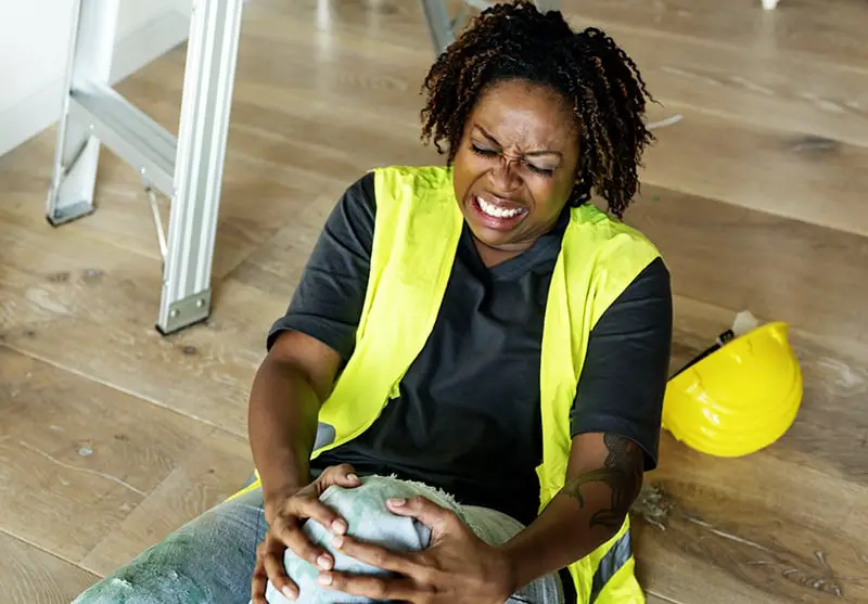 female construction worker injured because of slip and fall