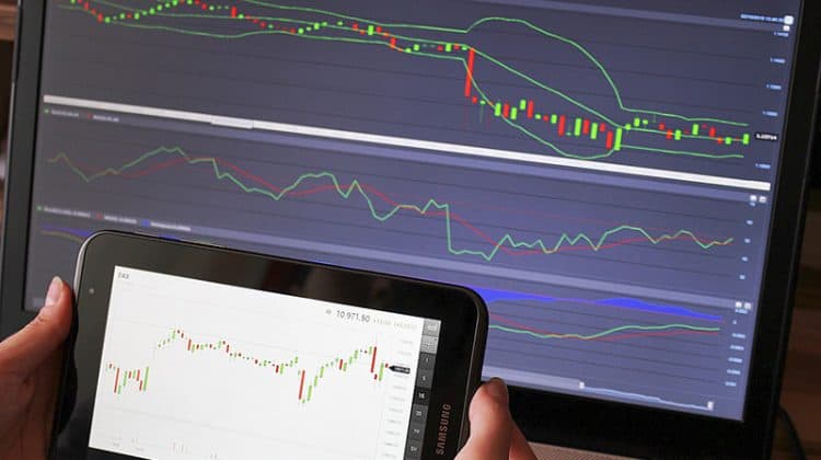 Forex trading analysis forex chart on the laptop and tablet screen