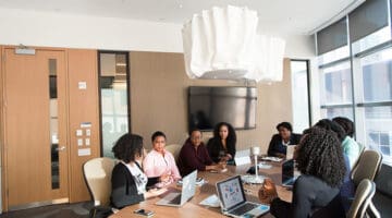 A group of business people in a conference table
