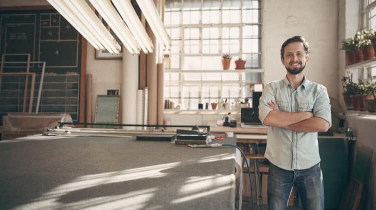 Small business owner in his place or work