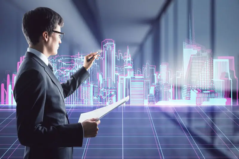 Smart City Project Design Concept With Architect Draws On Digital Screen Hologram Town With