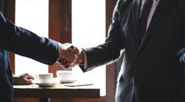 A client and customer doing a handshake