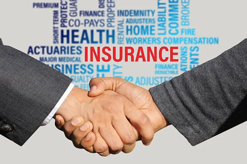 Insurance contract shaking hands