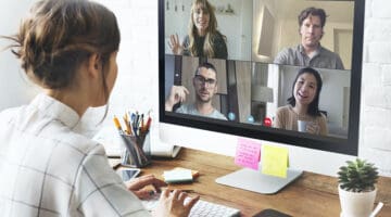 Woman in a video conference call in her home office during the coronavirus pandemic