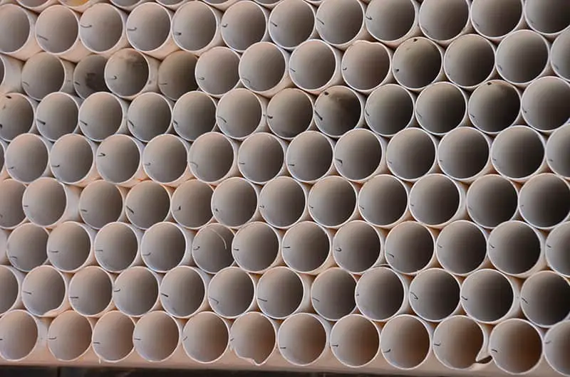 Pile of gray pvc water pipes