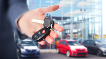 Hand of a person holding car keys
