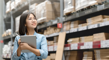 Woman checking inside warehouse
