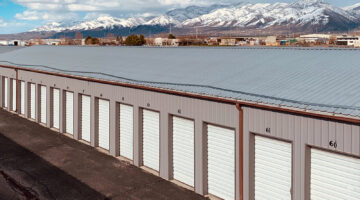 Snowy mountains & self storage in Logan, Utah. TK Secure Storage of Logan & Brigham City surrounded by mountains and panoramic views.