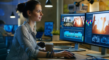 Female Video Editor Works with Footage on Her Personal Computer