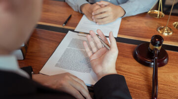 A lawyer talking to a client
