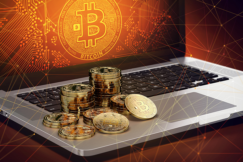 Bitcoin stock illustration on laptop