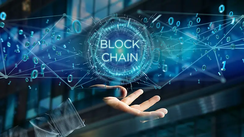 Hand of a person and the blockchain concept
