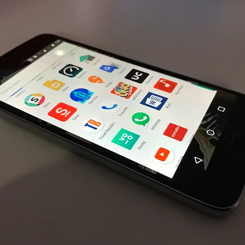 black android phone showing app icons on the screen