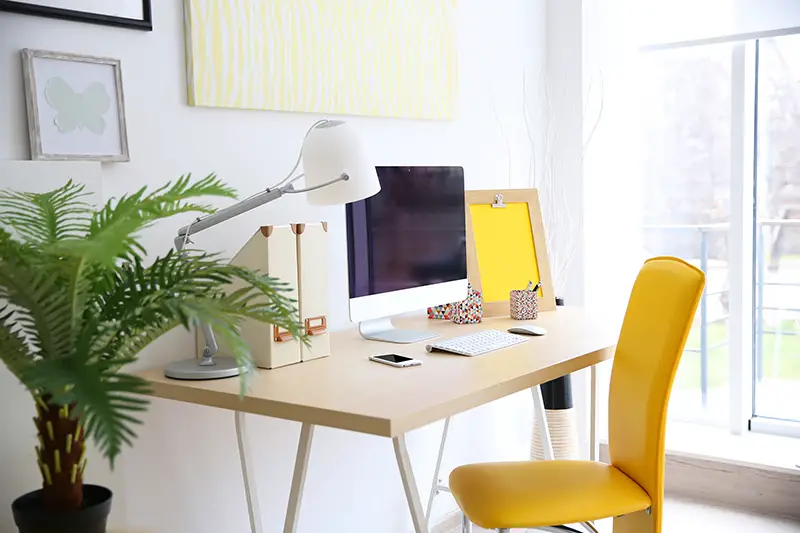 Stylish workplace with computer at home