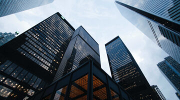 Low angle photo of city high rise buildings