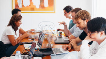 Group of people using laptops