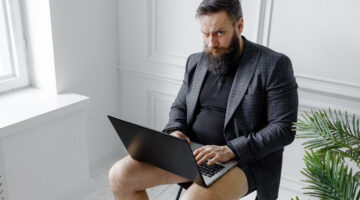 man half dressed - no trousers - for video interview