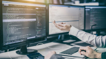Web developer working in front of his computer