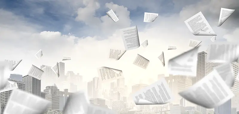 background image with papers flying in air