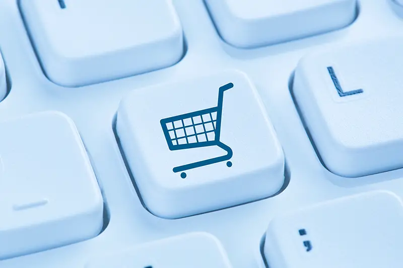 Online shopping e-commerce ecommerce internet shop concept symbol blue computer keyboard