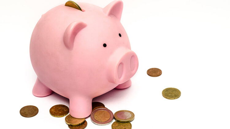 Piggy bank with coins