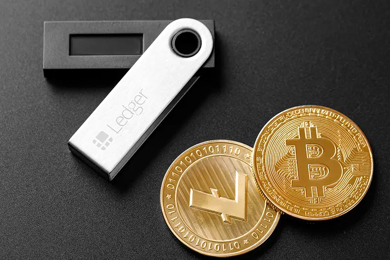 Ledger hardware wallet for cryptocurrency on a black background