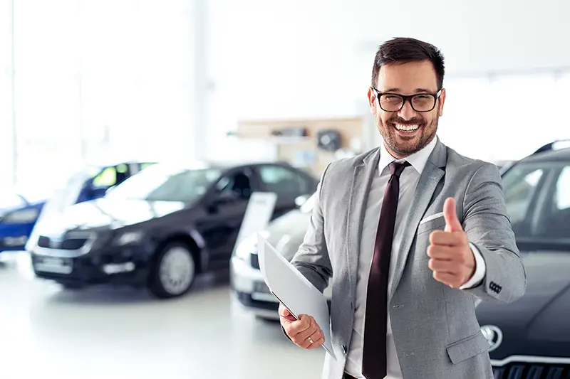 Happy car sales agent