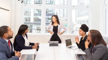 Leader having a meeting with her team