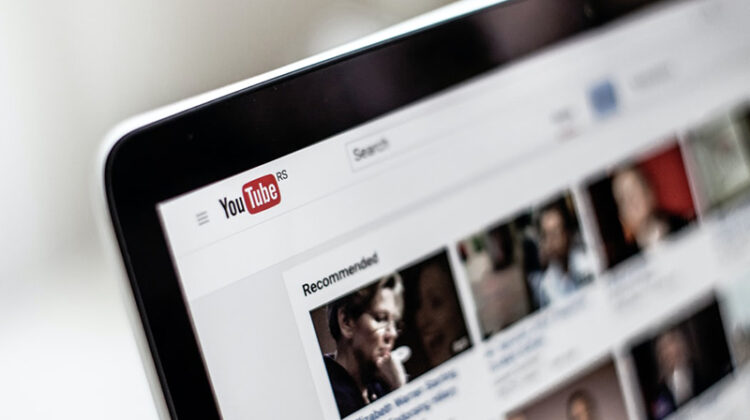 black iPad with Youtube on the screen
