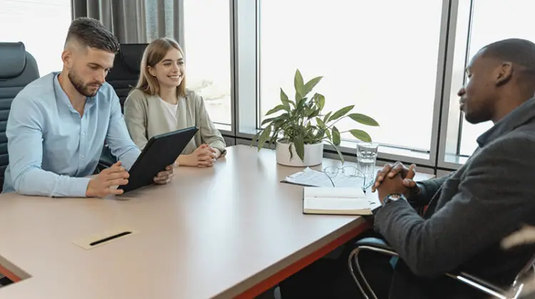 Man and woman conduction an interview