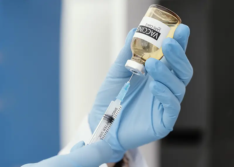 vaccine syringe and vaccine vial sars-cov-2 coronavirus